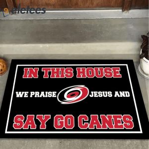 In This House We Praise Jesus and Say Go Canes Doormat1